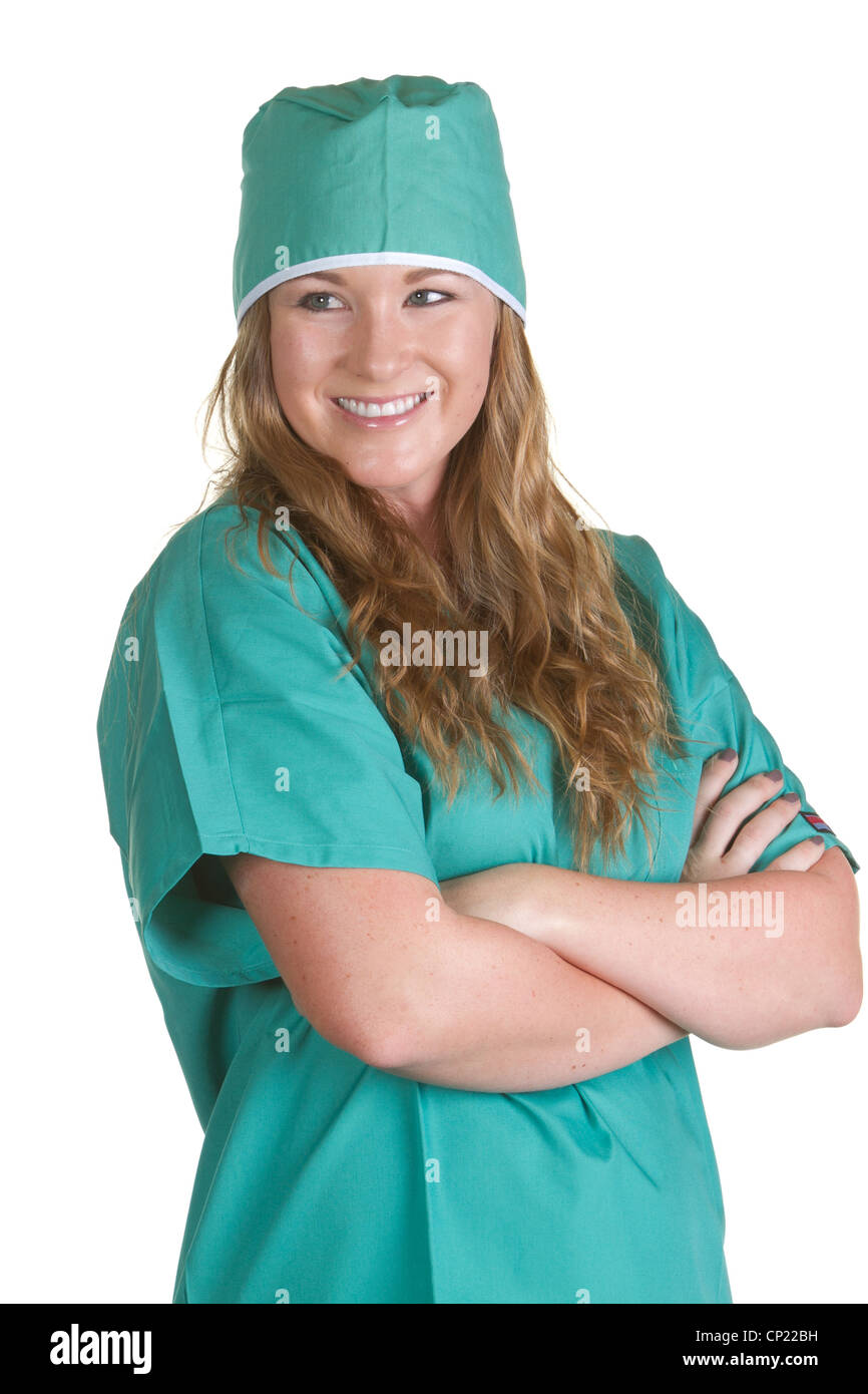 Smiling female nurse wearing green scrubs with surgical hat Stock Photo