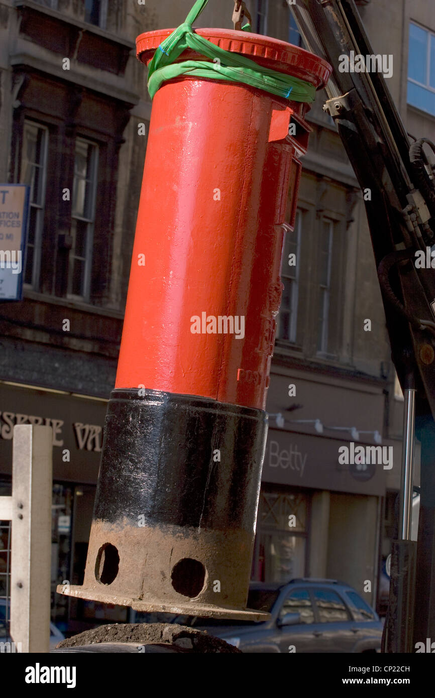 Pillar box being moved by crane, Queen's Road, Bristol. Stock Photo