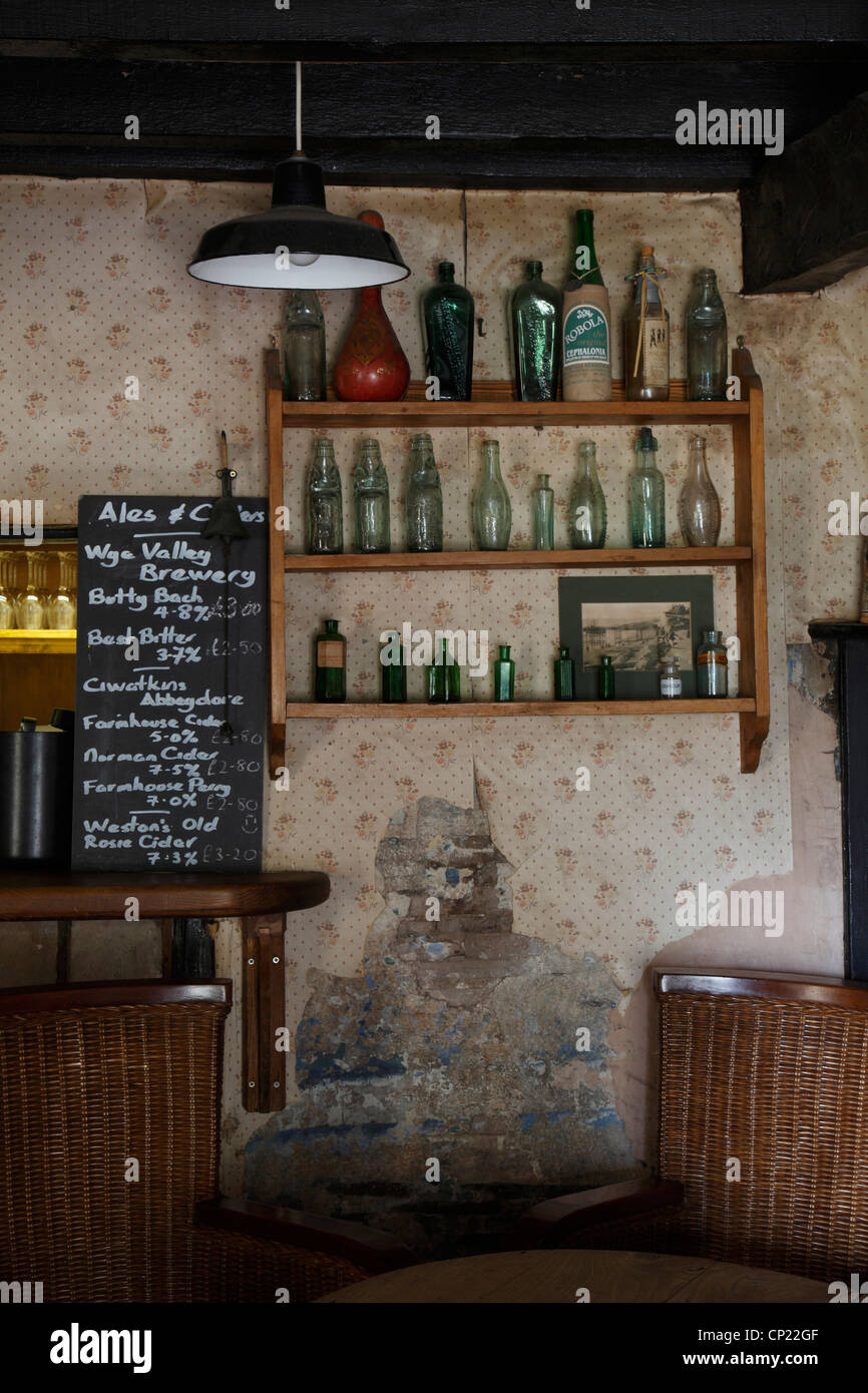 Shelving with vintage glass bottles Stock Photo Alamy