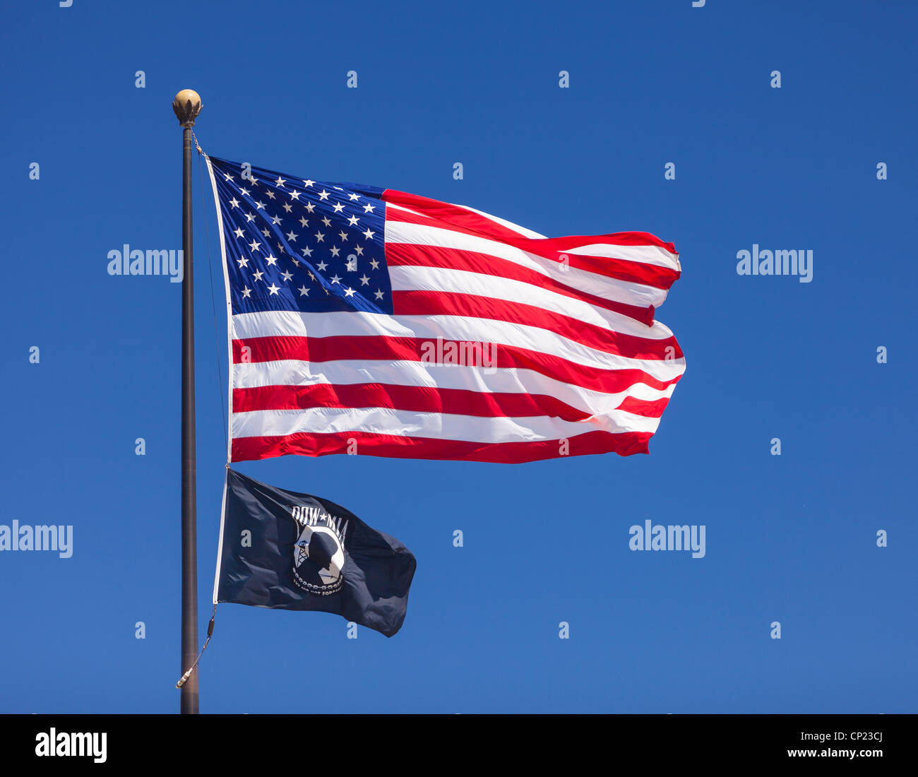 WASHINGTON, DC, USA - U.S. flag and POW MIA flag, at World War II Memorial. Stock Photo