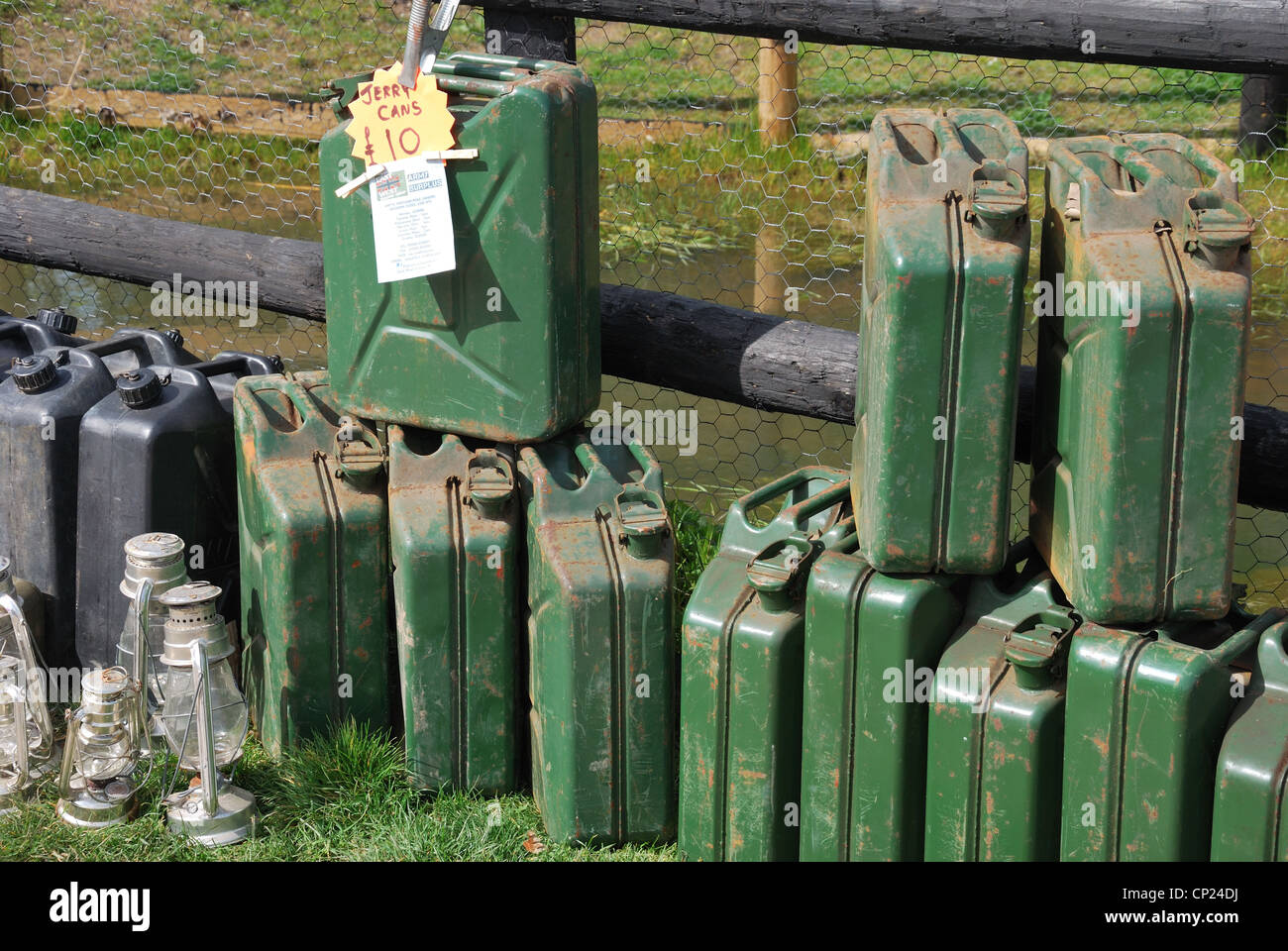 row of jerry cans for sale Stock Photo Alamy