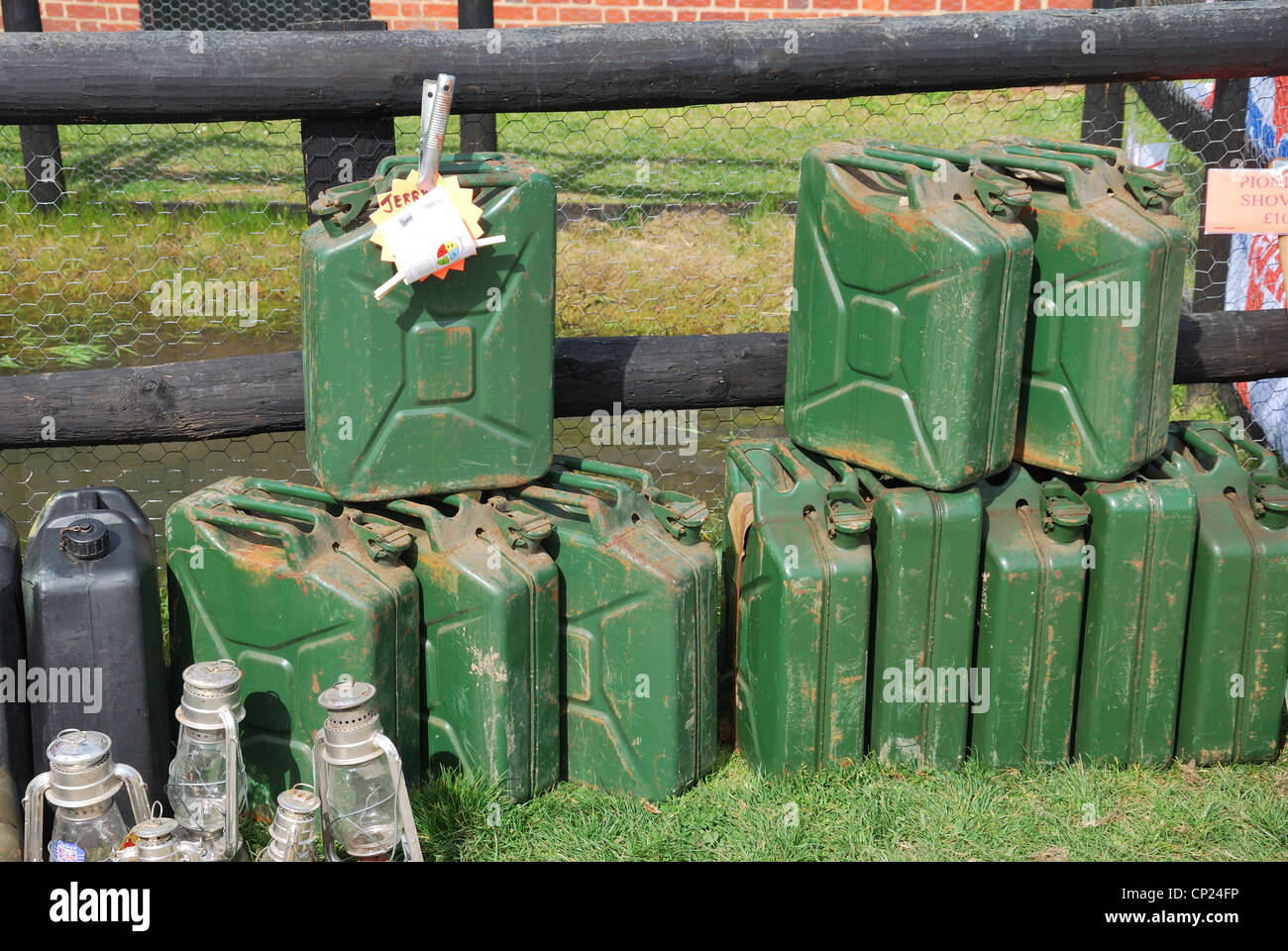 row of jerry cans for sale Stock Photo Alamy