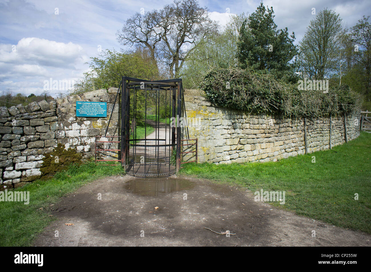 Cannon Kissing Gate at the entrance to the Chatsworth Estate Derbyshire Peak District Stock Photo