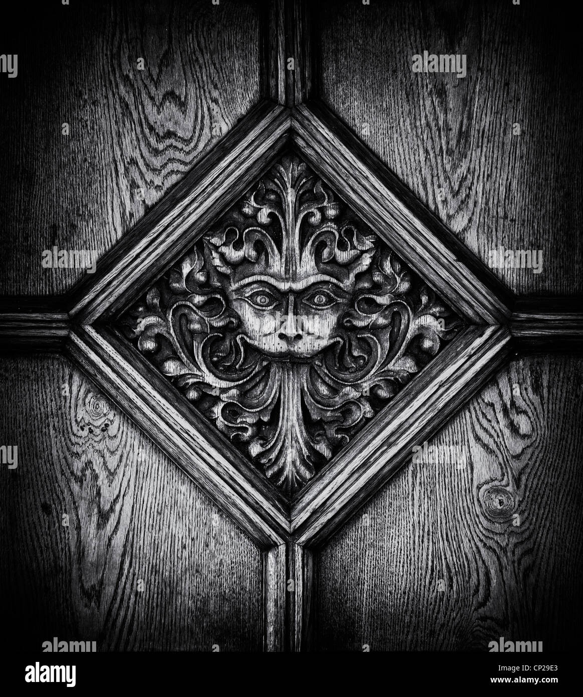 The Aslan door. Lion face door carving. Brasenose College, Oxford, Oxfordshire, England. Monochrome Stock Photo