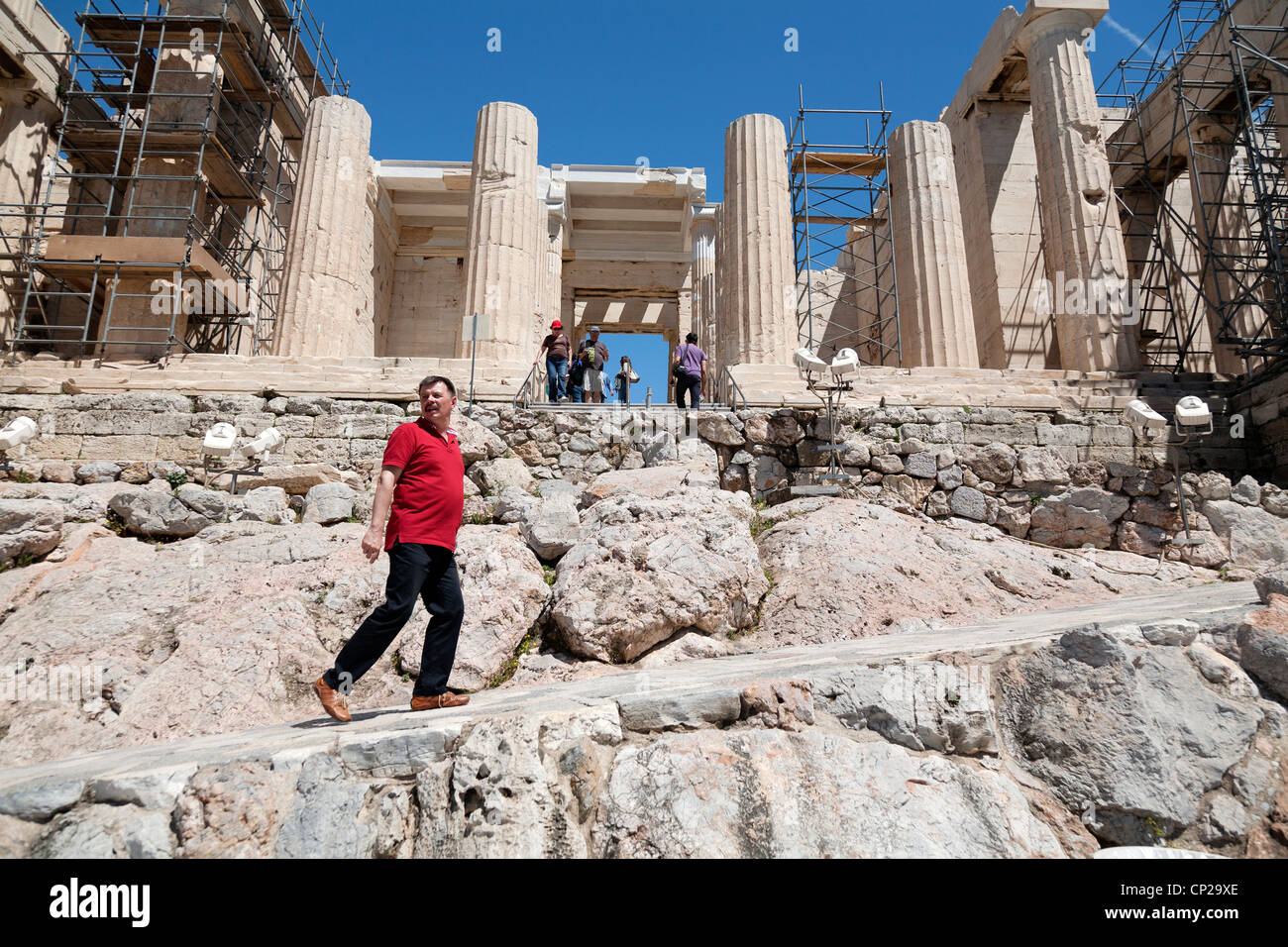 Tourists at the Propylaea of the Athenian Acropolis, Greece. Stock Photo
