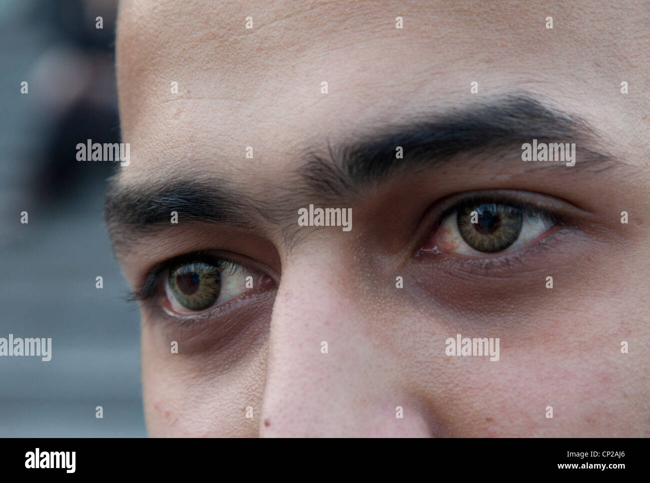 Young Asian male wearing coloured contact lenses Stock Photo Alamy