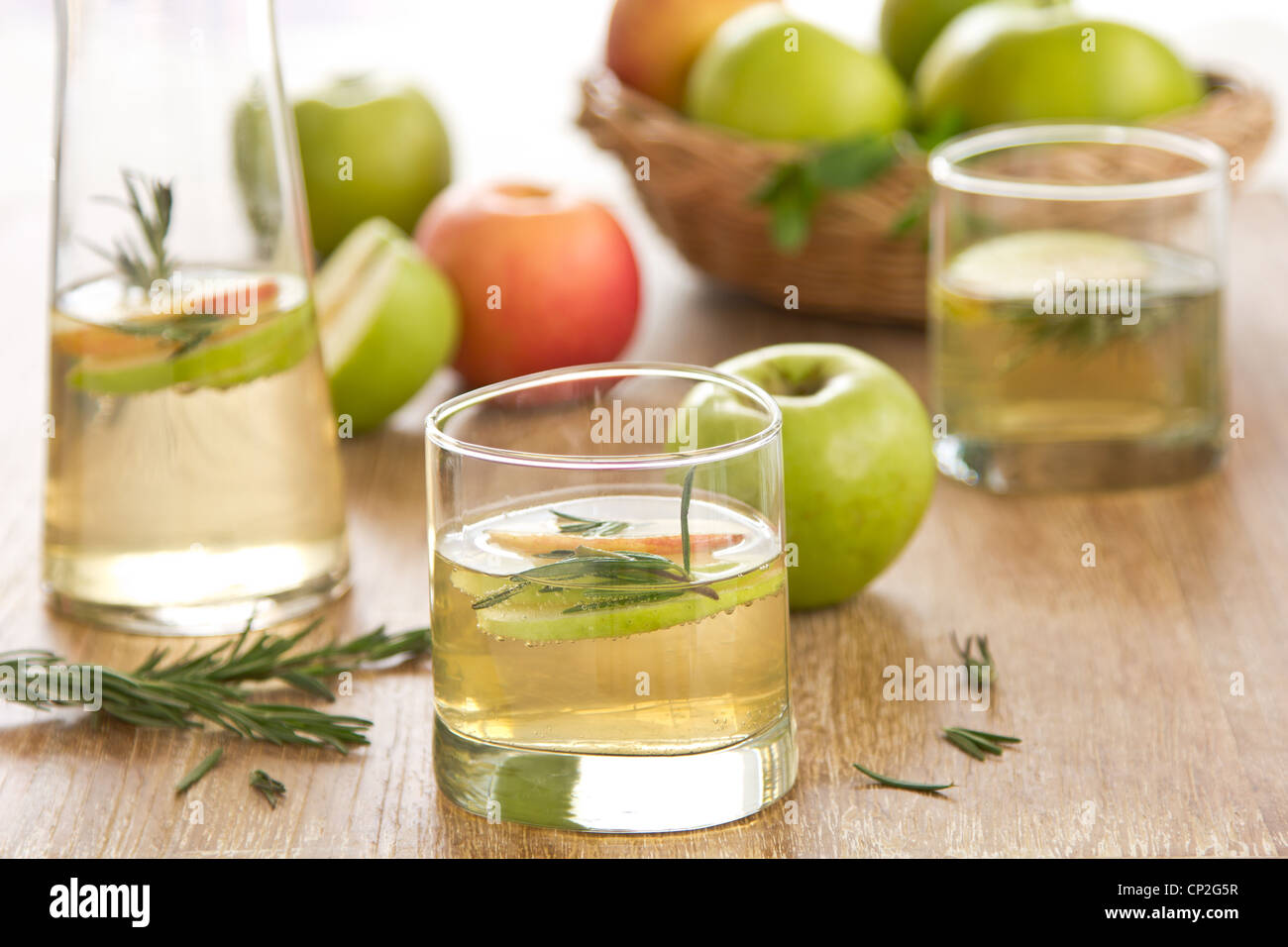 Apple juice with rosemary Stock Photo Alamy