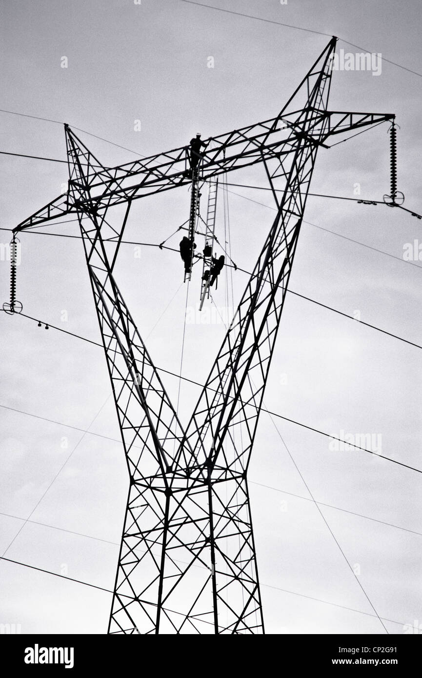 Men fixing power lines, Australia Stock Photo Alamy