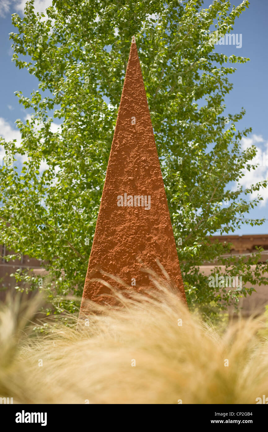 An abstract pyramid sculpture soars to the blue sky in Santa Fe, New ...