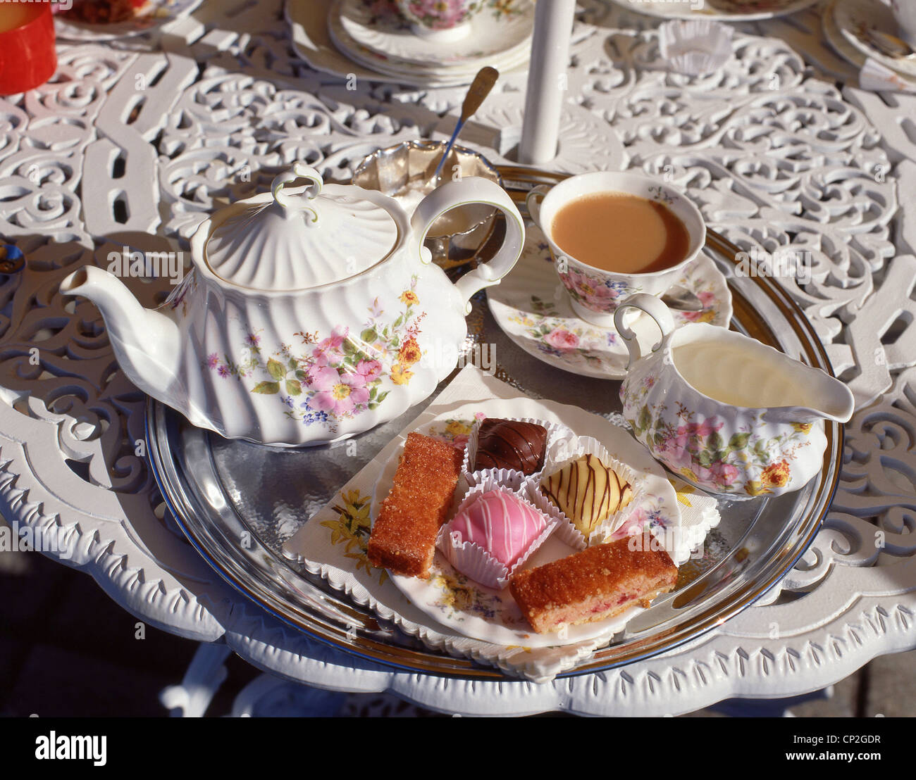 Afternoon tea and cakes in garden, Winkfield, Berkshire, England, United Kingdom Stock Photo