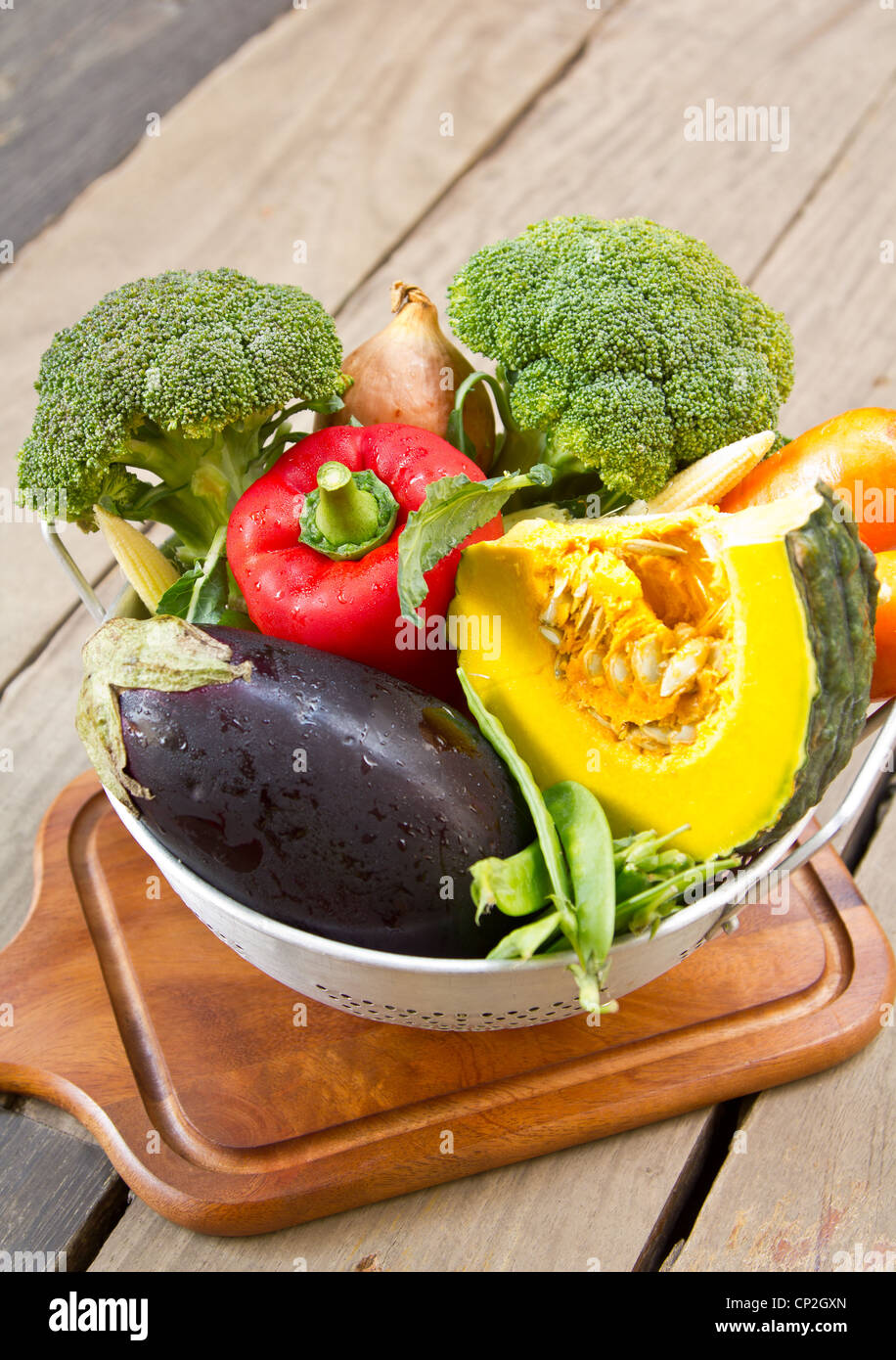 Varieties of vegetables in colander Stock Photo Alamy