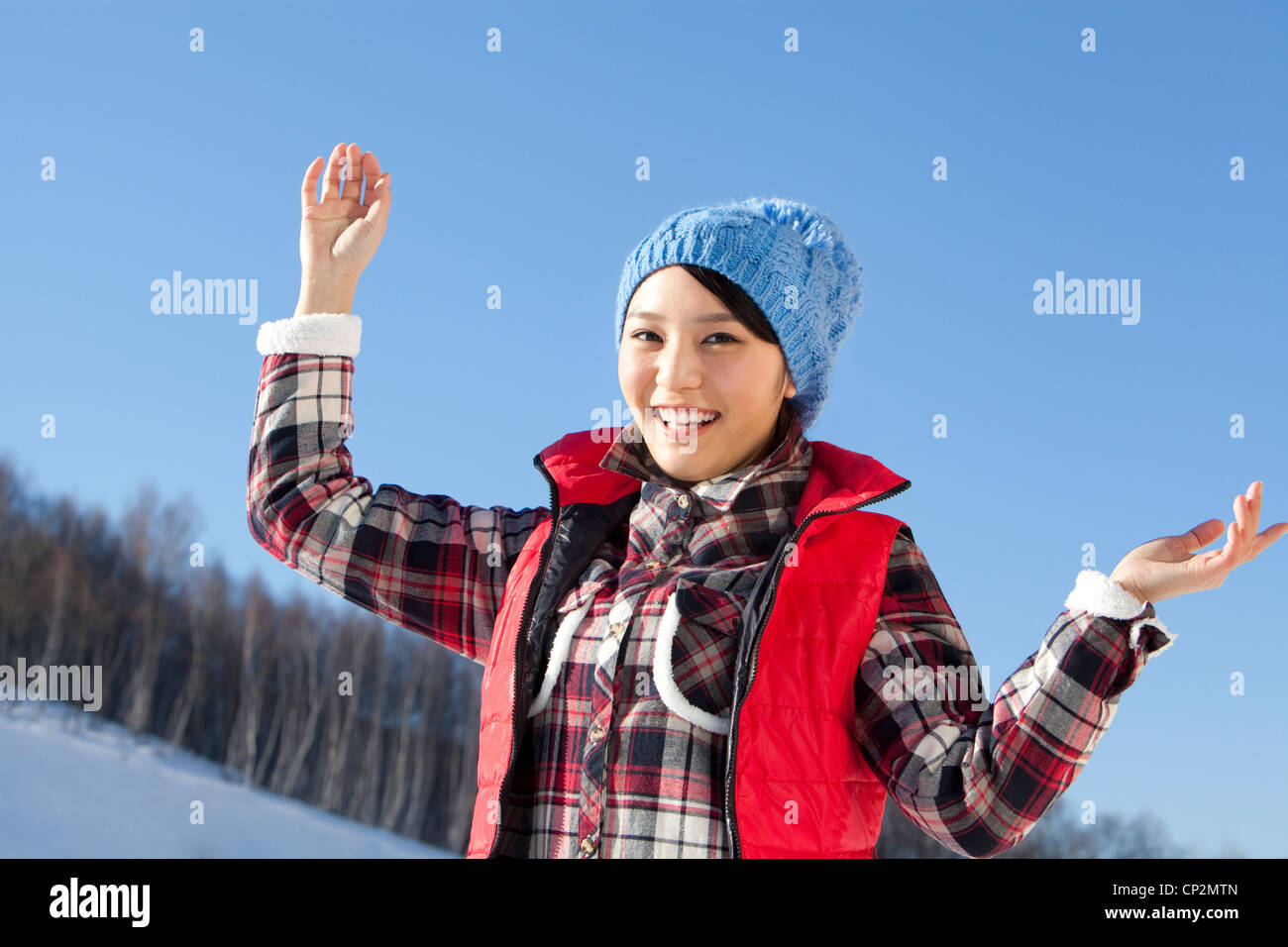 Woman arms up looking sky hi-res stock photography and images - Alamy