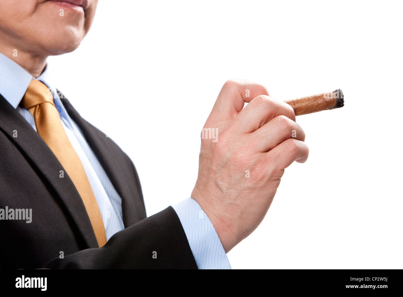 Businessman holding a cigar Stock Photo