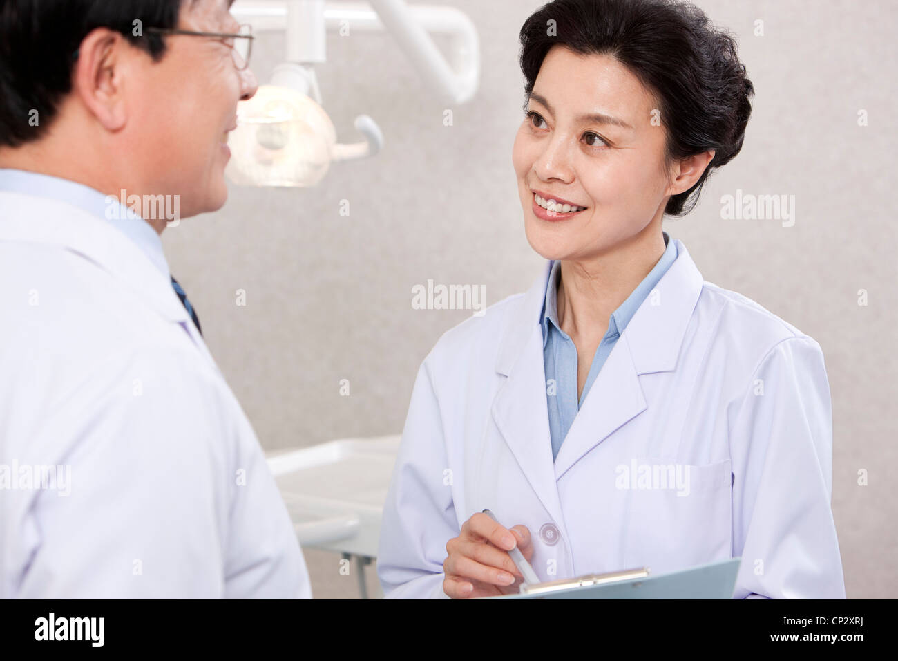 Dentists in dental clinic Stock Photo Alamy