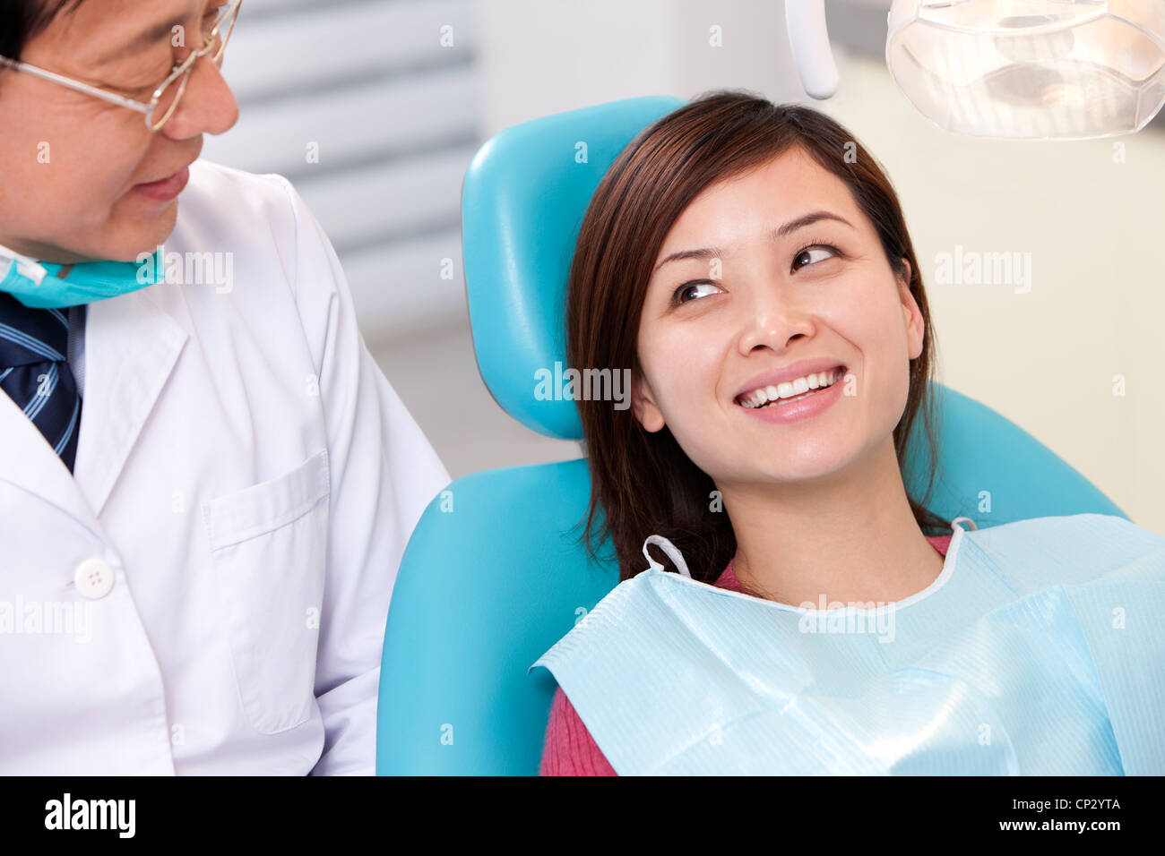 Patient receiving treatment in dental clinic Stock Photo Alamy