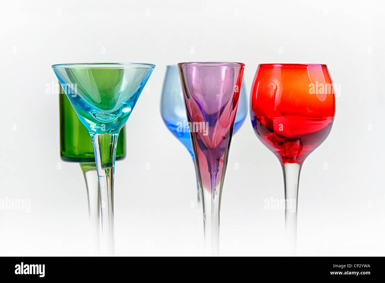 Collection of coloured cocktail glasses Stock Photo Alamy