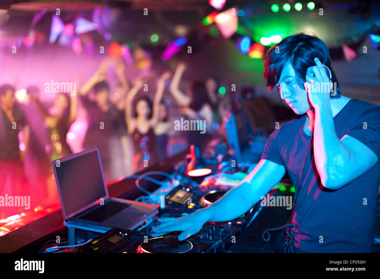 DJ doing record Scratching in Stock Photo Alamy
