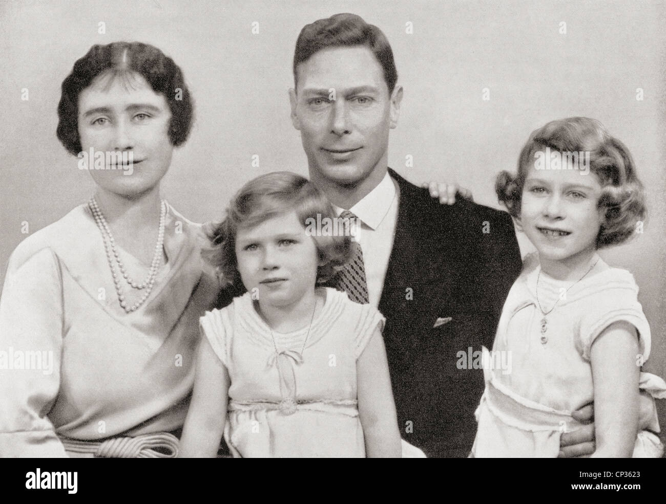 King George VI with his wife Queen Elizabeth and daughters Margaret and Elizabeth, later to reign as Queen Elizabeth II Stock Photo