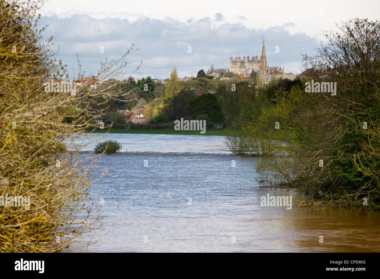 The River Exe overflowing into Exeter's flood relief and breaking the banks of the Quay following heavy rain. Stock Photo