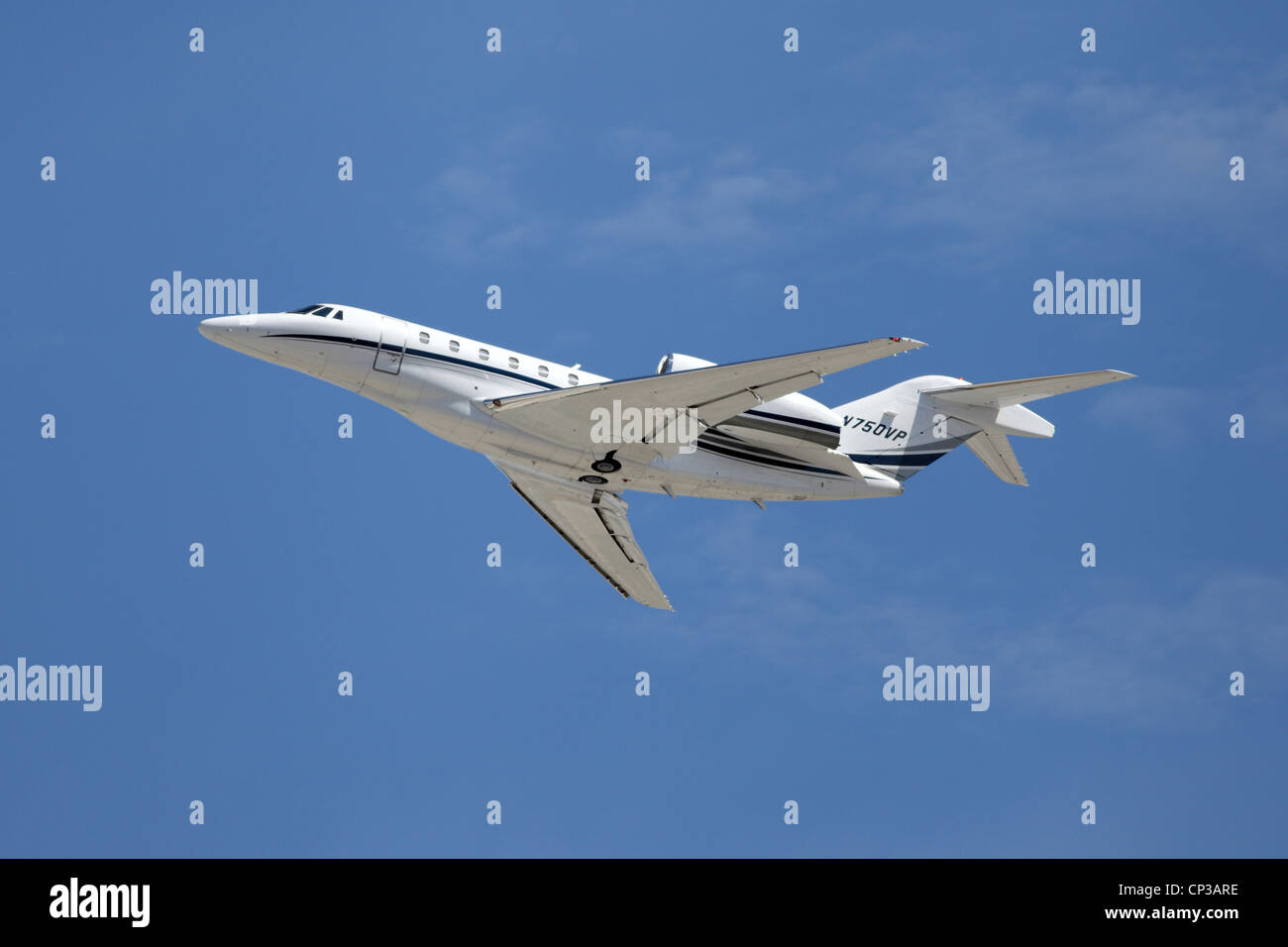 A Cessna 750 (N750VP) takes off from Los Angeles Airport on April 24, 2012. It is the fastest civilian plane made at Mach .92. Stock Photo