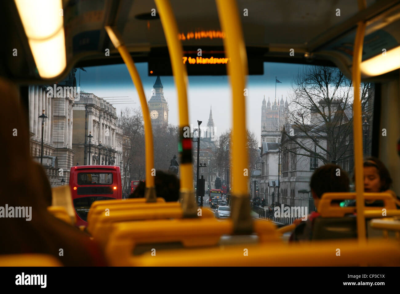 Inside view of  London Double Decker Bus, passengers are seating on upper deck [Editorial only] Stock Photo