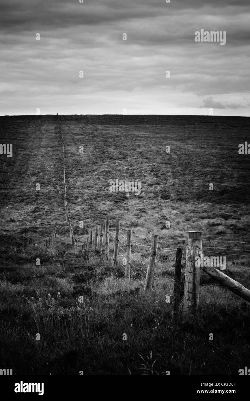 fence post into the distance Stock Photo Alamy