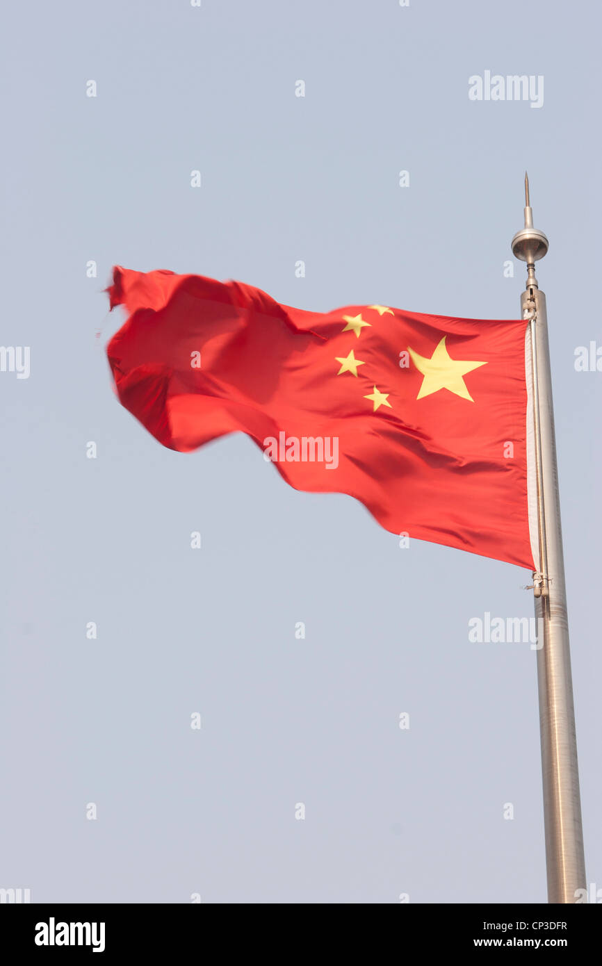 The flag of the People's Republic of China.  Flying on the Bund (Zhongshan Dongyi Lu), Shanghai, China. Stock Photo