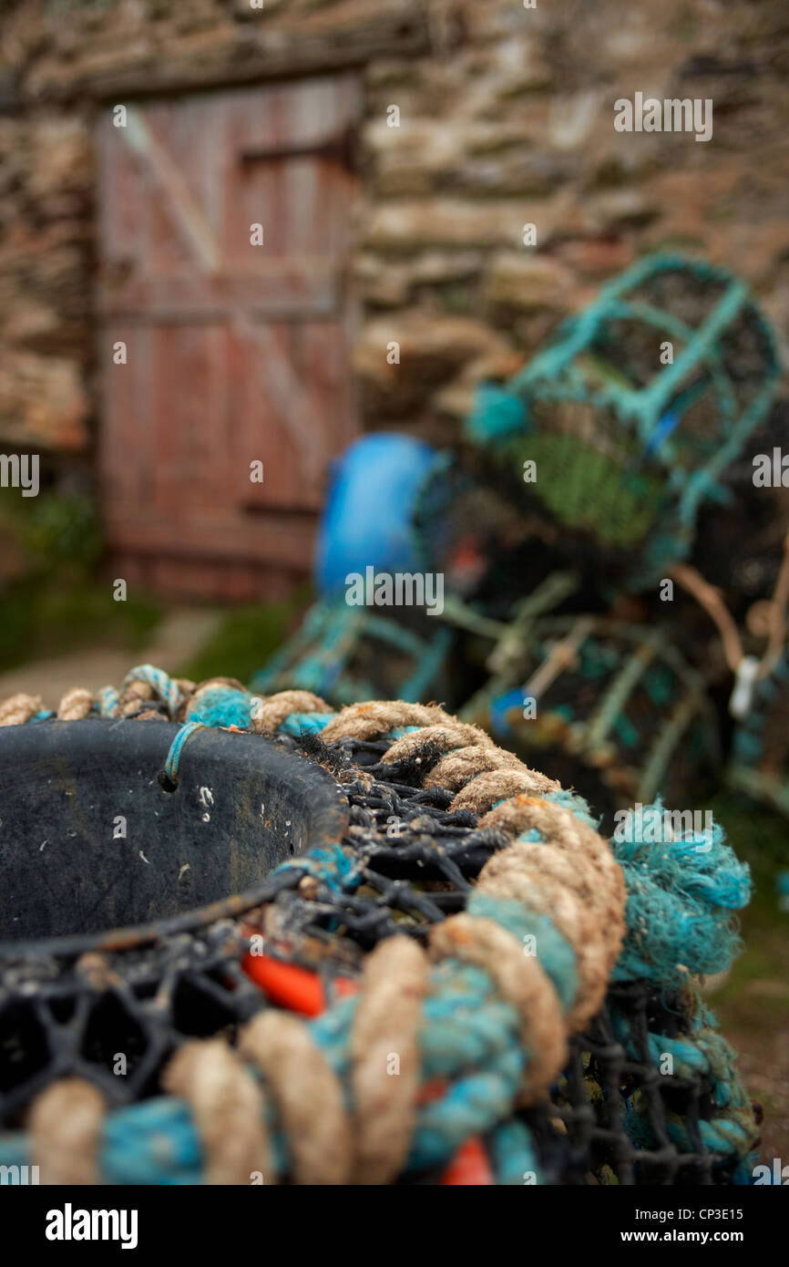Lobster pots on the quayside at Hope Cove on the South Devon coast