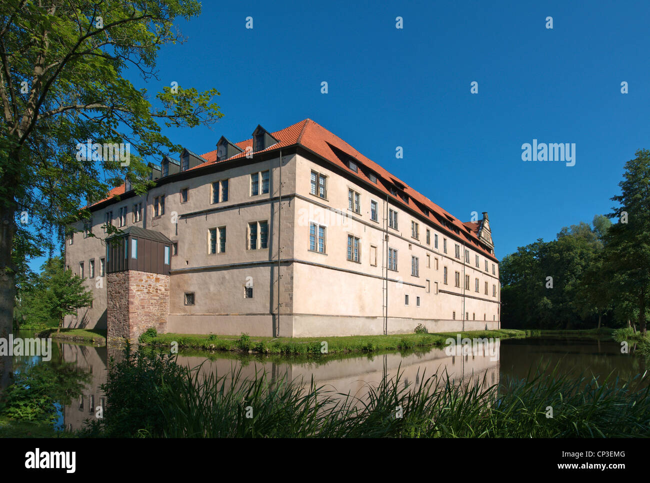 Brake castle with moat in Lemgo, built in the renaissance style from 1587 on as the residence of the Counts zur Lippe. Stock Photo