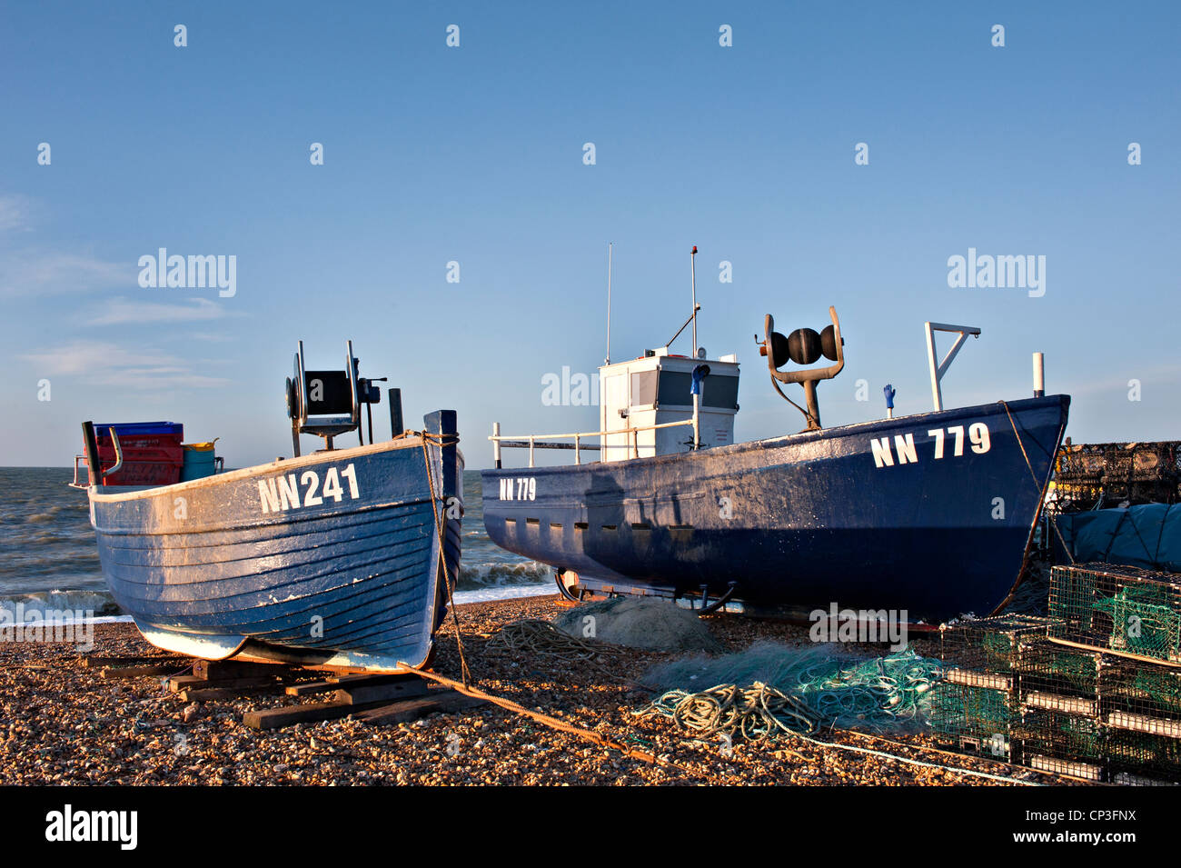 Fishing boats on the beach at Eastbourne, East Sussex Stock Photo Alamy