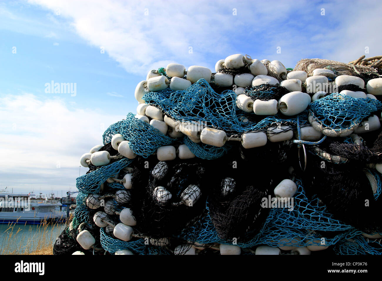 Nylon fishing net with float line attached to small plastic floats Stock  Photo - Alamy