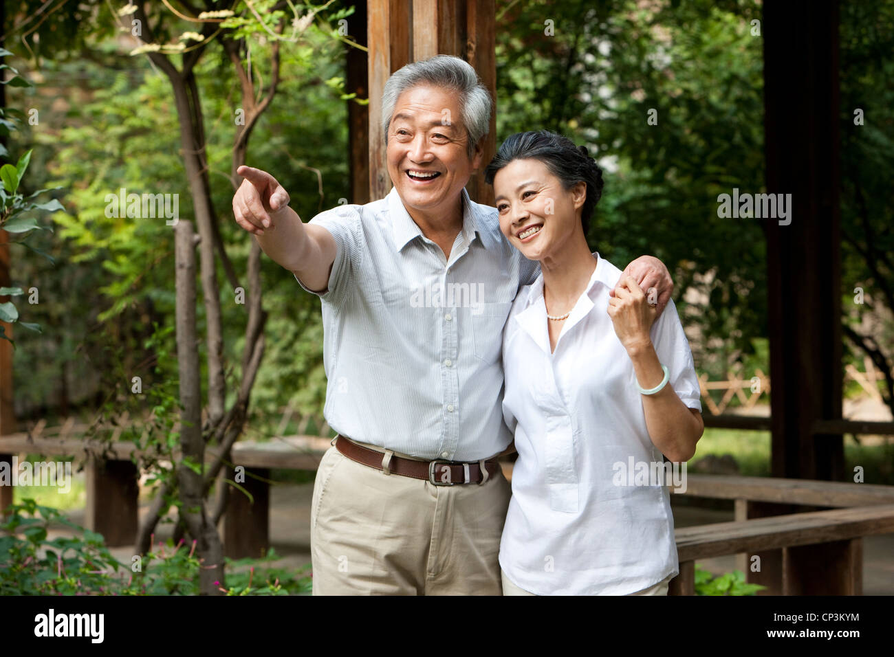 Senior Chinese couple in a park Stock Photo - Alamy