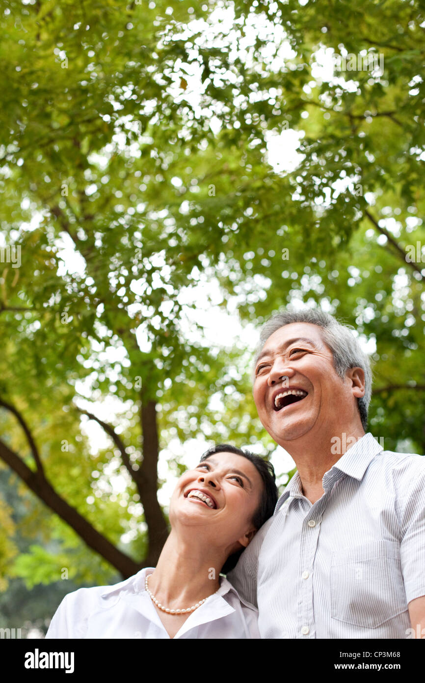 Senior Chinese couple in a park Stock Photo - Alamy