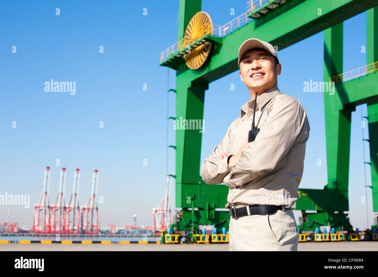 male-shipping-industry-worker-with-walkie-talkie-stock-photo-alamy