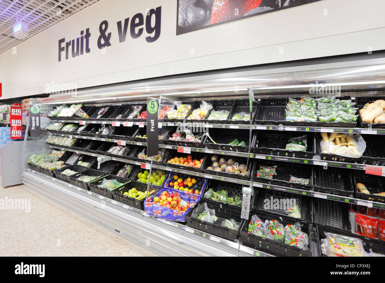 Supermarket fruit and vegetable aisle. Stock Photo