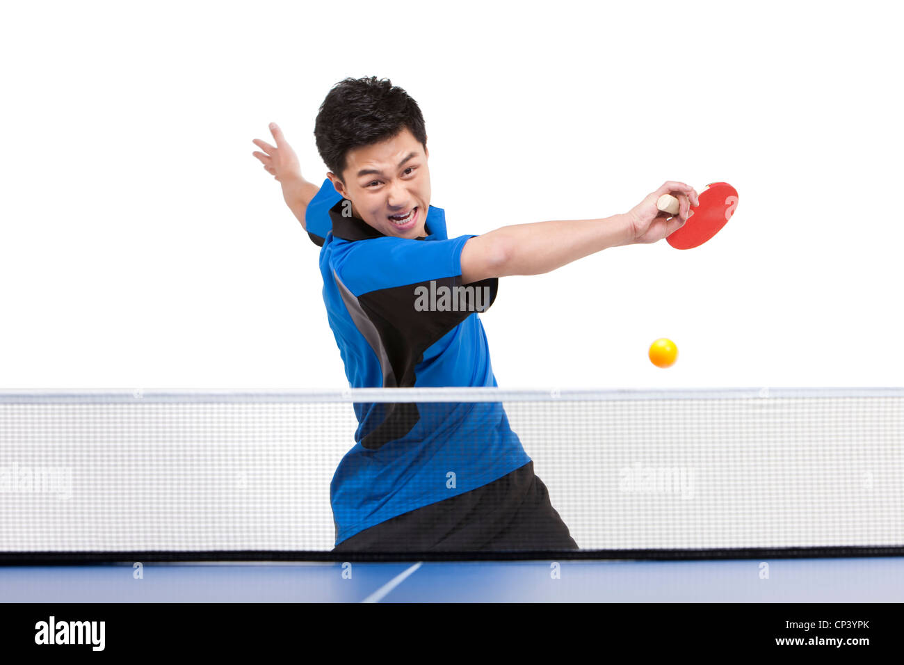 Table tennis player swinging smash Stock Photo - Alamy