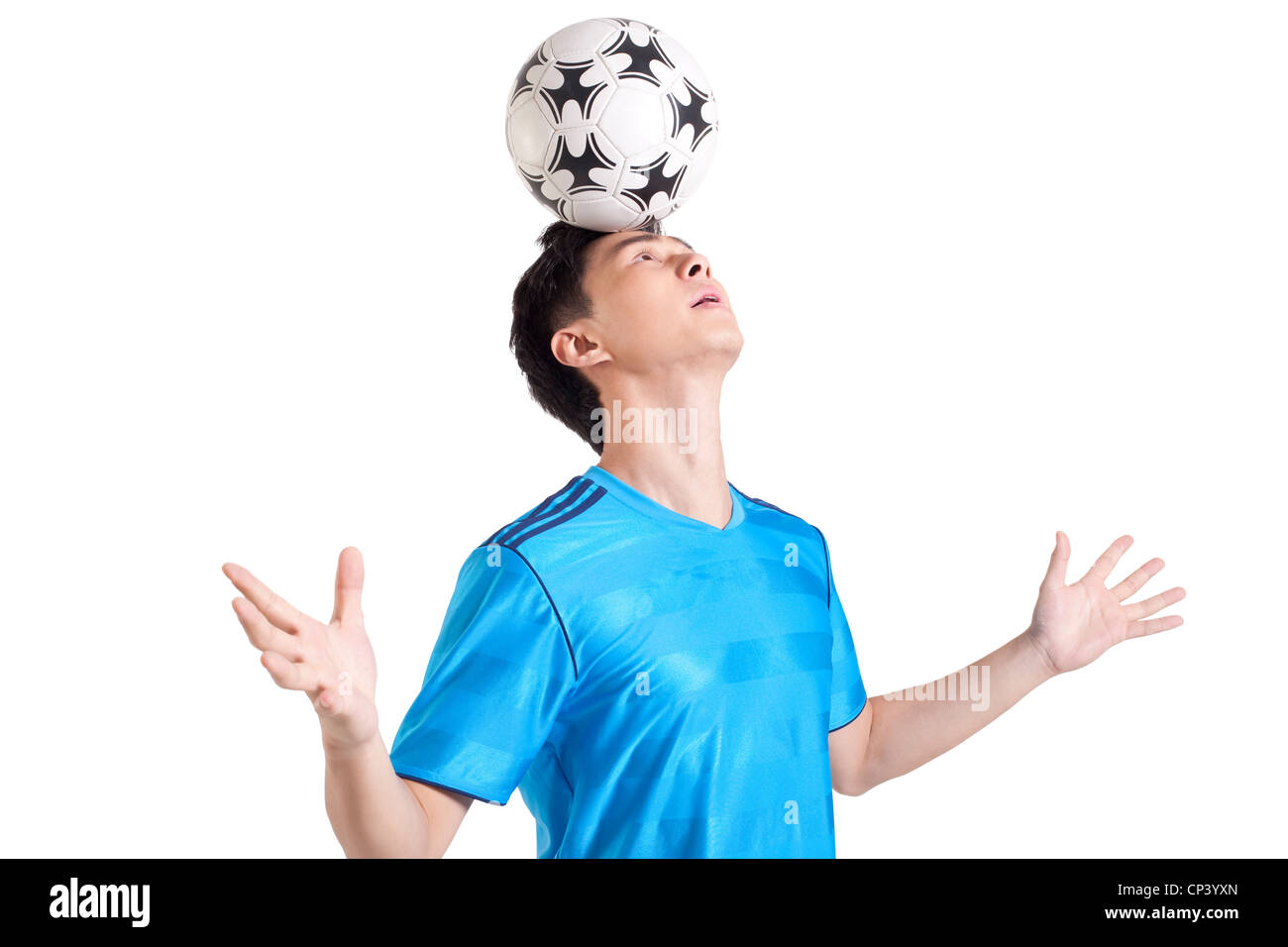 Balance soccer ball on head hires stock photography and images Alamy