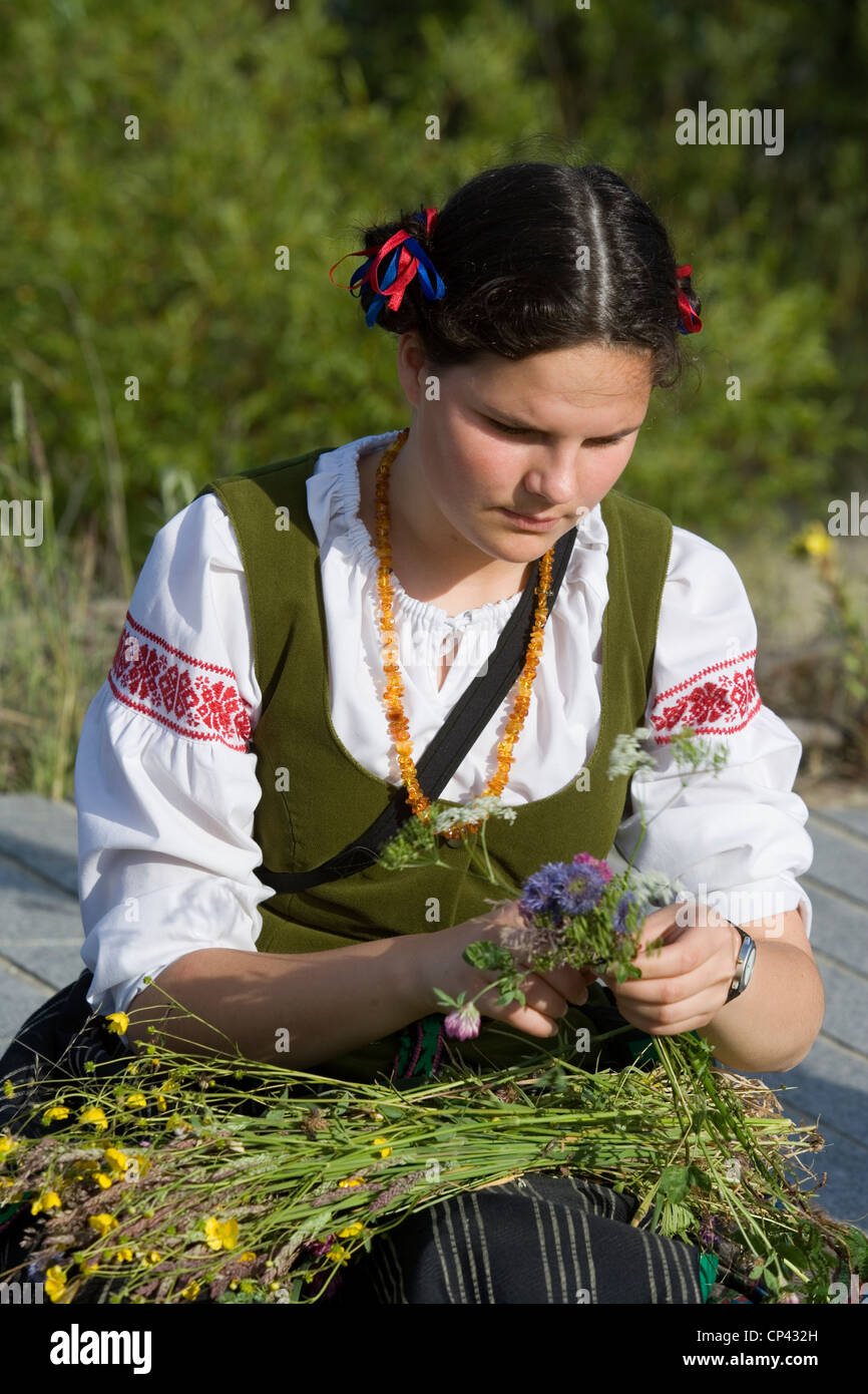 Lithuania - Klaipeda County - Curonian Spit (Neringa or) - Nida. Folk festival. Girl in traditional costume Stock Photo