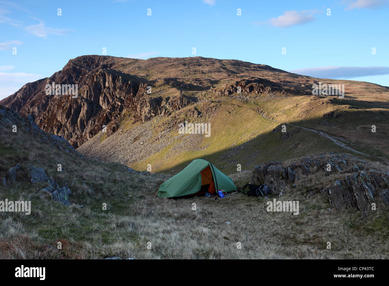 Lightweight Backpacking Tent on the Lower Slopes of Dale Head with the Mountain of High Spy Behind Lake District Cumbria UK Stock Photo