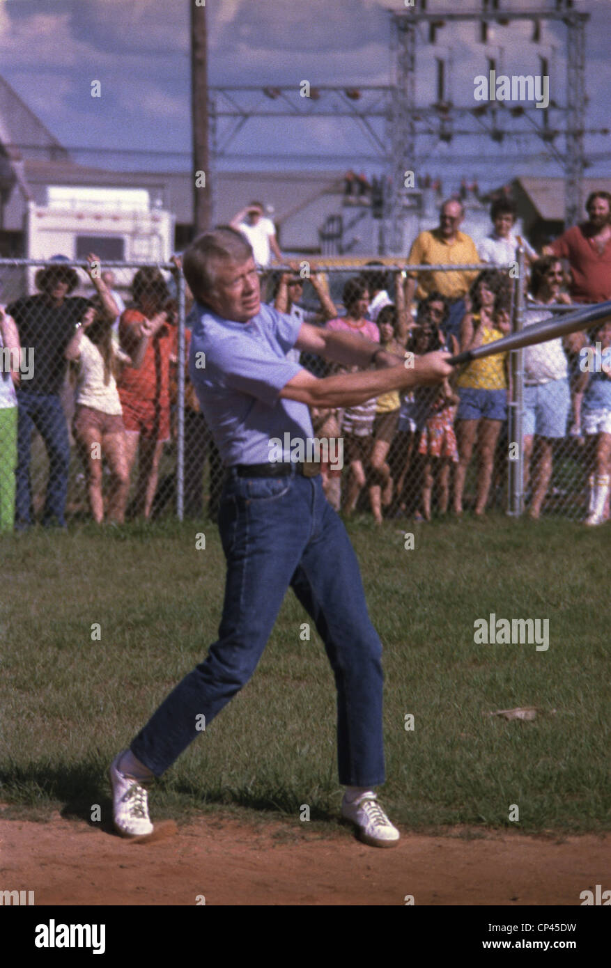 Jimmy Carter at bat during a softball game in his hometown of Plains Georgia. July 7 1977. Stock Photo
