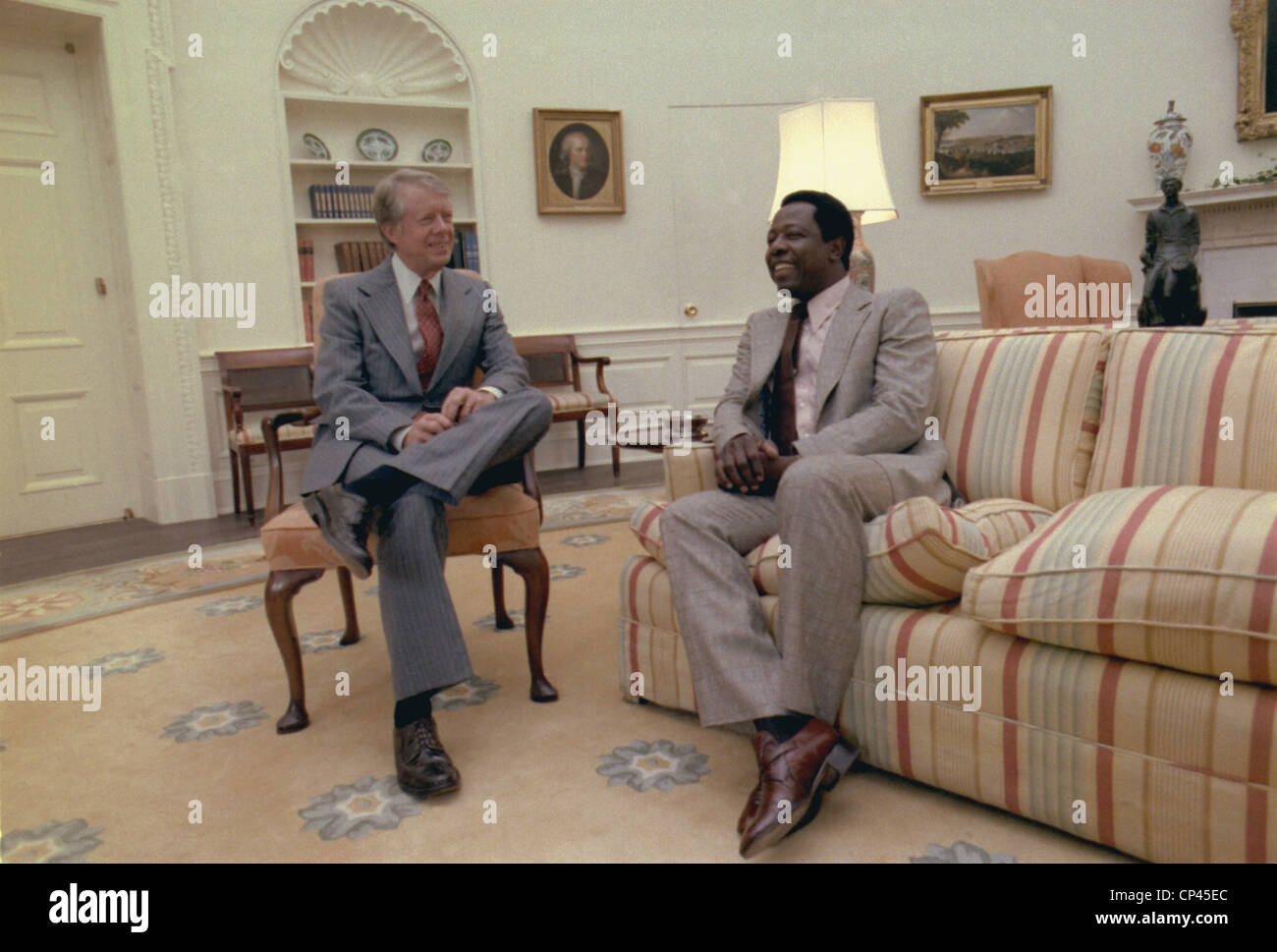 Jimmy Carter chatting with Hank Aaron in the Oval Office. Carter was Governor of Georgia and at the Atlanta Braves game when Stock Photo