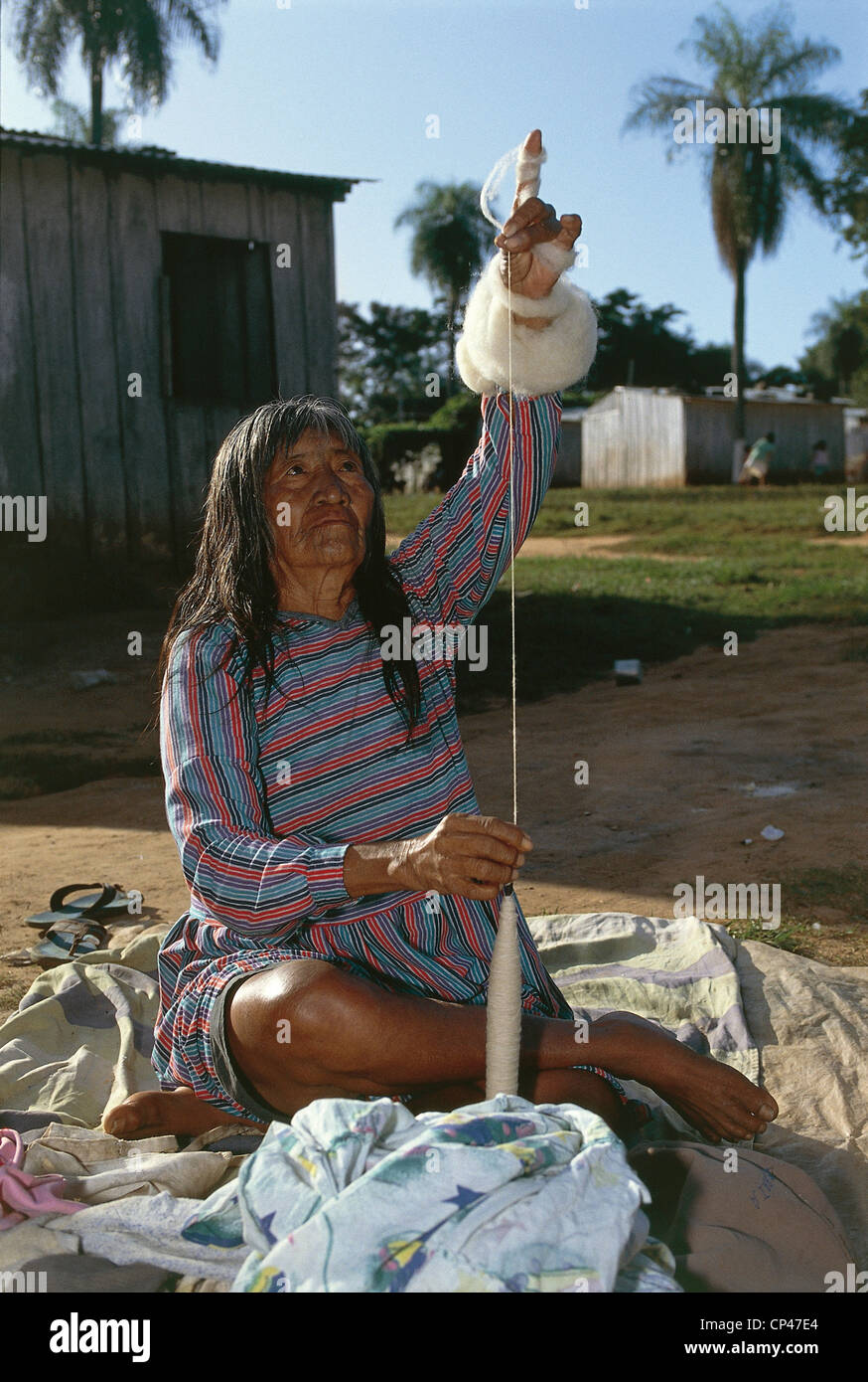 Paraguay - Maca Indians spins the wool. Stock Photo