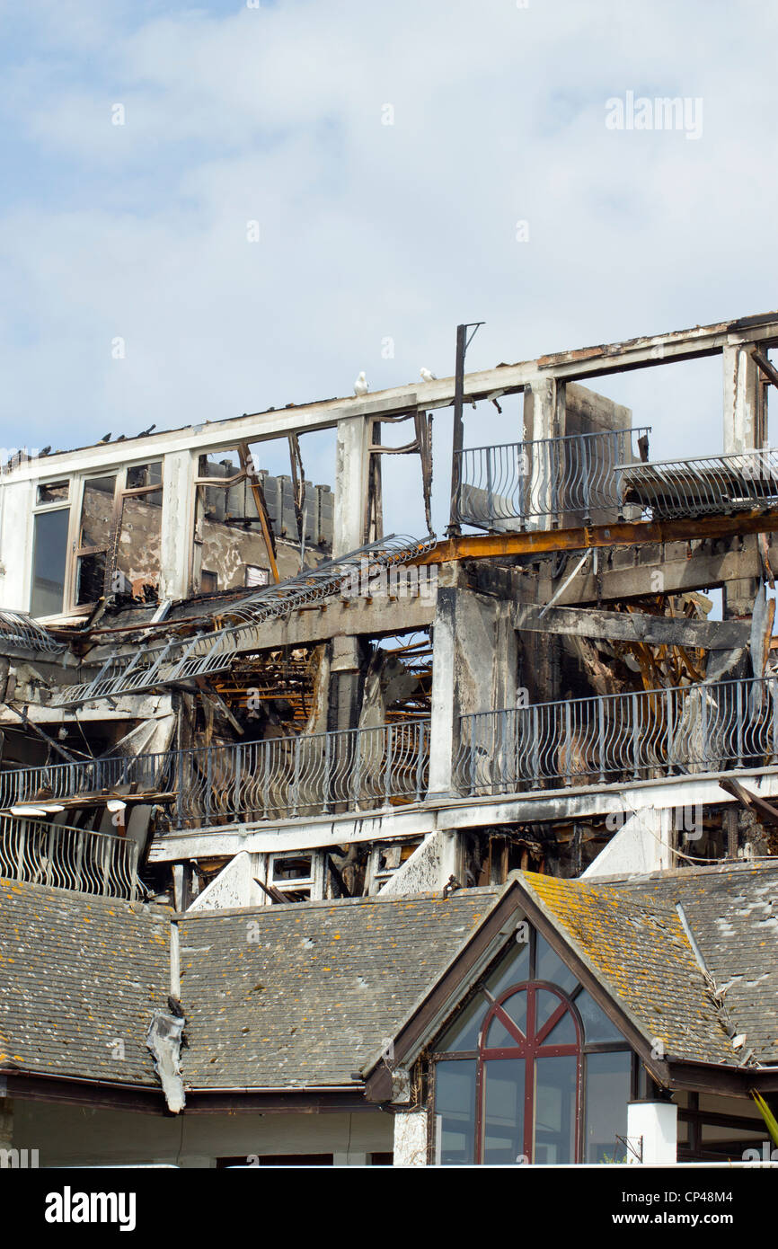Close up burnt out remains of the Best Western Falmouth Beach Resort Hotel in Cornwall UK. Stock Photo