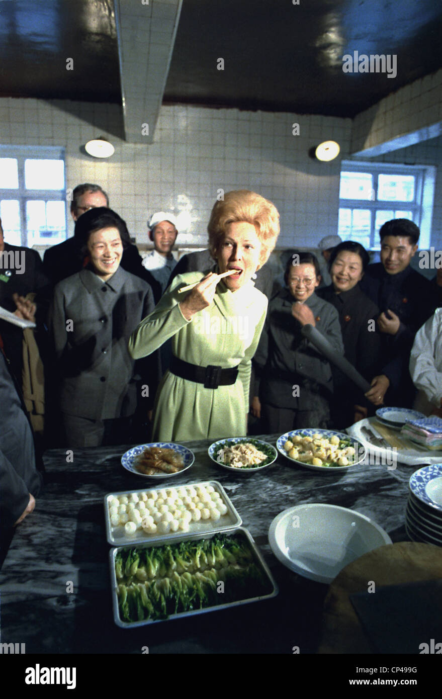 Nixon in China. Pat Nixon samples cuisine on a visit to the Beijing
