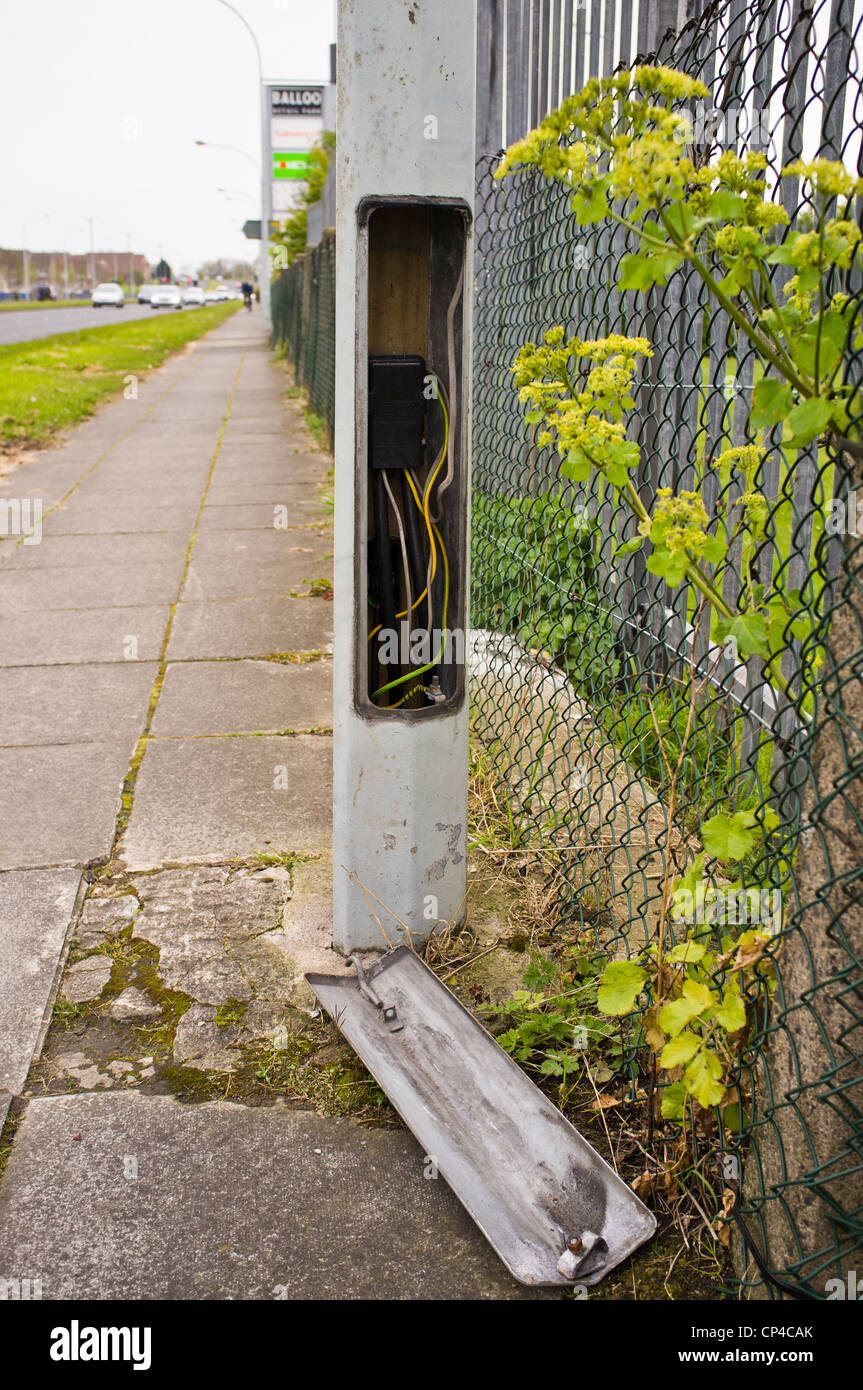 Cover removed from lamp post or street light showing wires Stock Photo Alamy