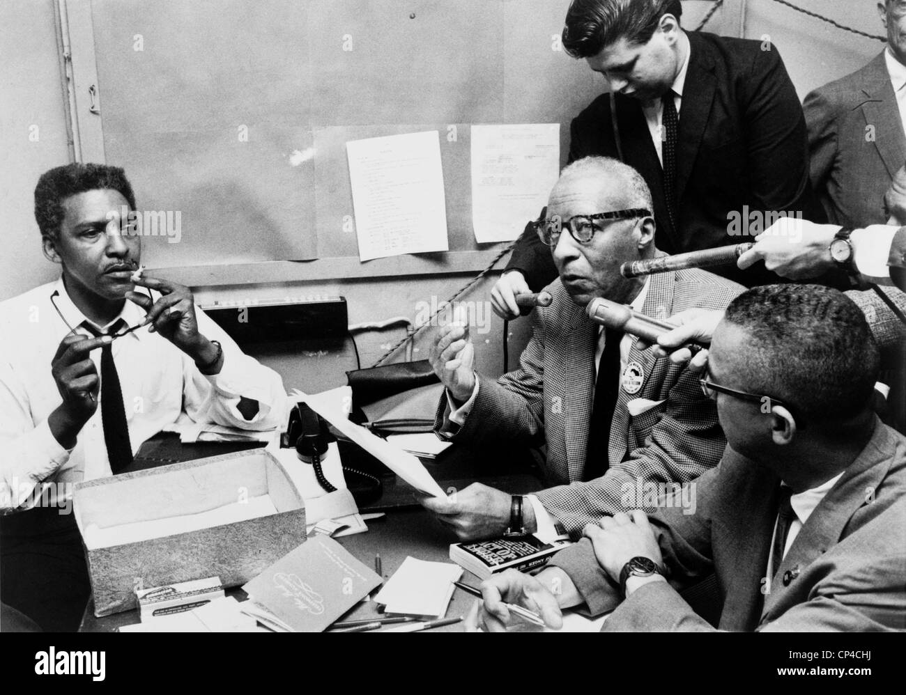 Leaders of the 1963 March on Washington holding a press conference in the New York headquarters. L to R: Bayard Rustin, A. Stock Photo