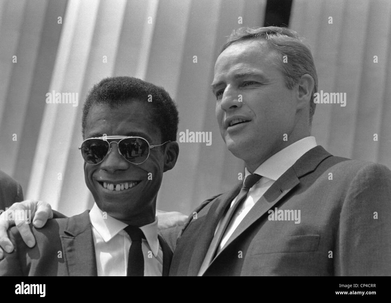 Author James Baldwin and actor Marlon Brando at the 1963 Civil Rights March on Washington. Aug. 28, 1963. Stock Photo