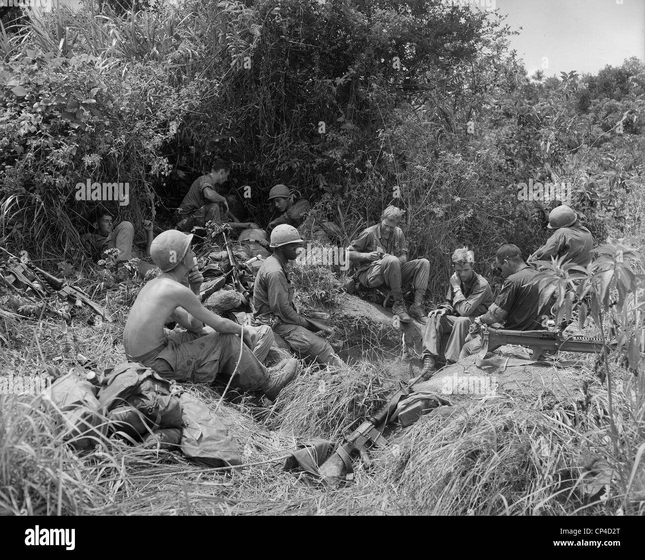 Vietnam War. Soldiers of the 101st Airborne Division, take a break from jungle fighting east of Tam Ky, the capital city of Stock Photo