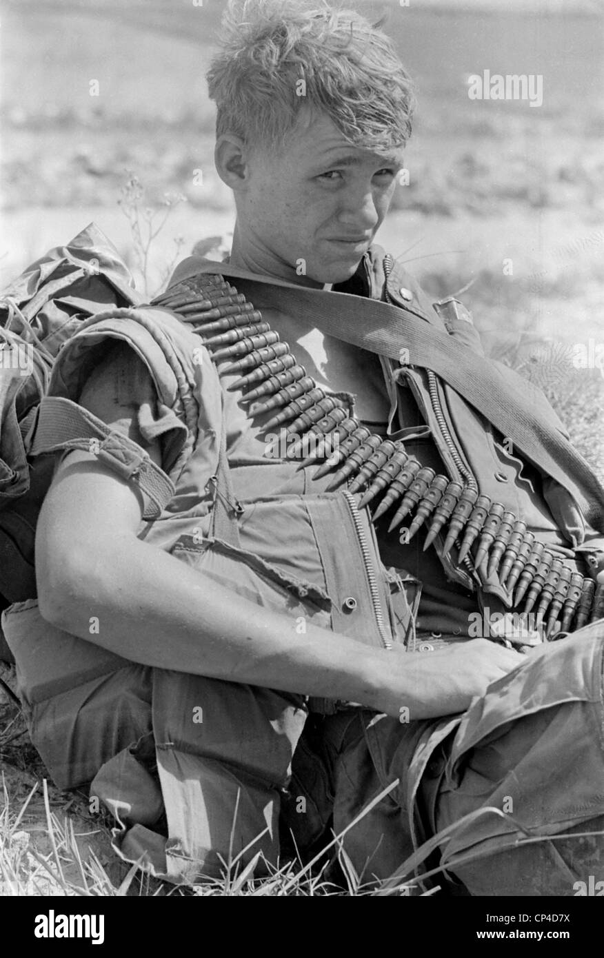 Vietnam War. US Marine takes a break during a ground movement 25 miles north of An Hoa, North Vietnam. 1969. Stock Photo