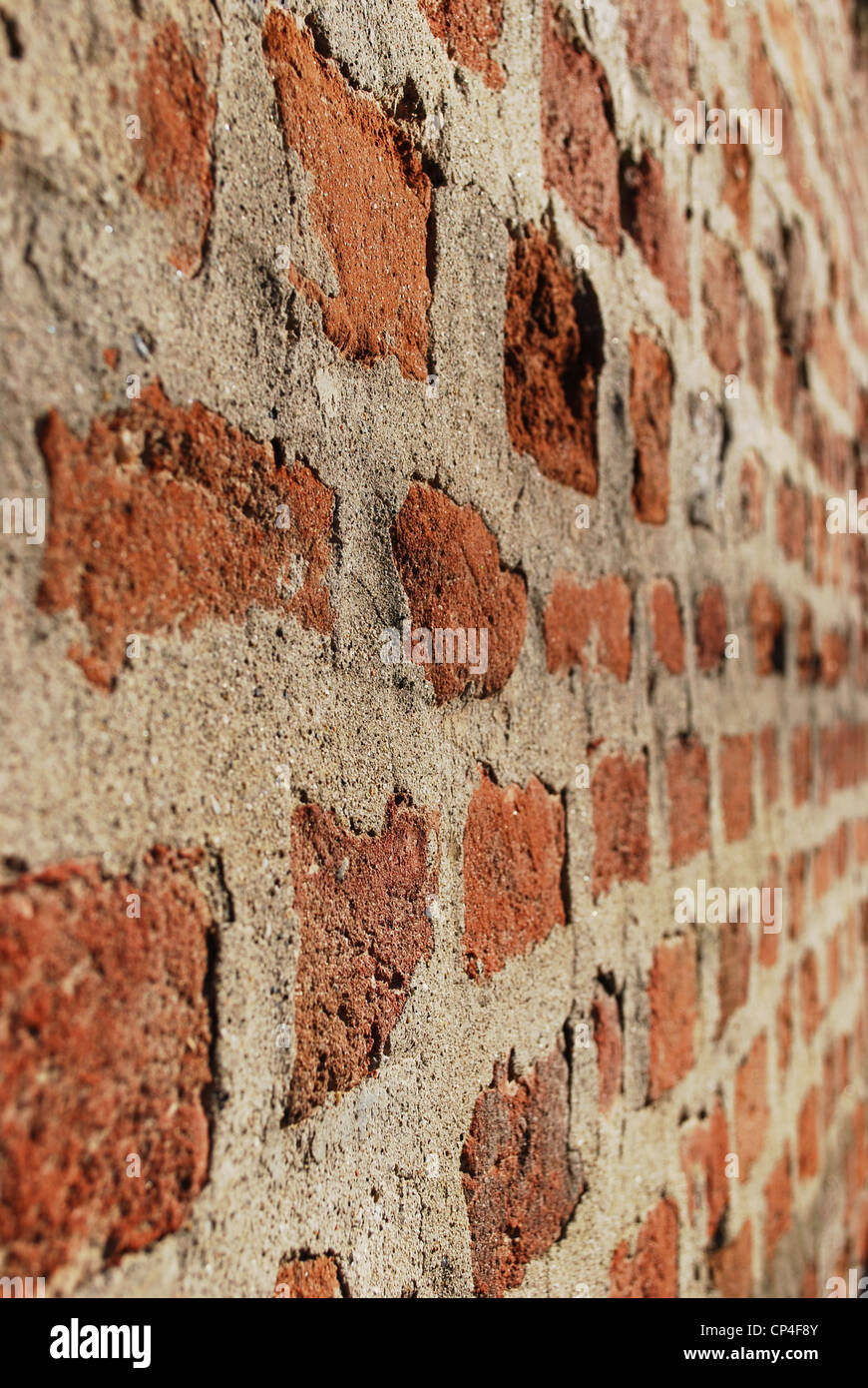 Red ancient brick wall texture perspective background, vertical Stock Photo